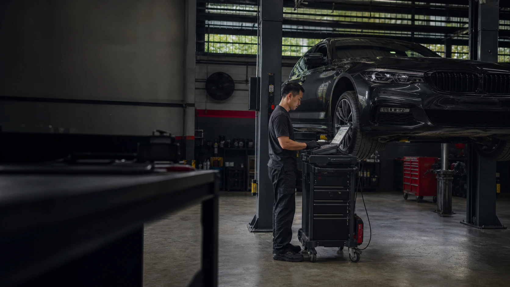 European sedan inside an organized specialist workshop